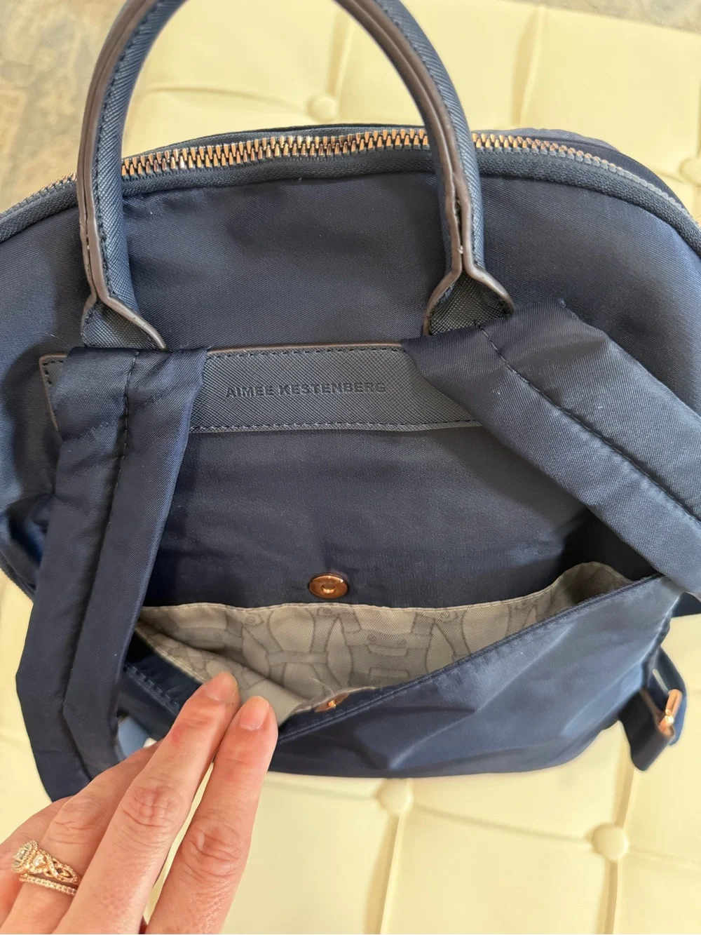 Aimee Kestenberg Navy Backpack with Rose Gold Accents